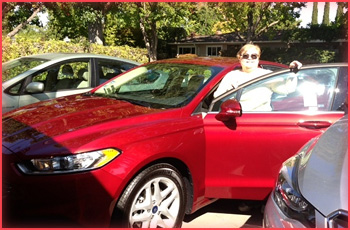Marsha with her new car.
